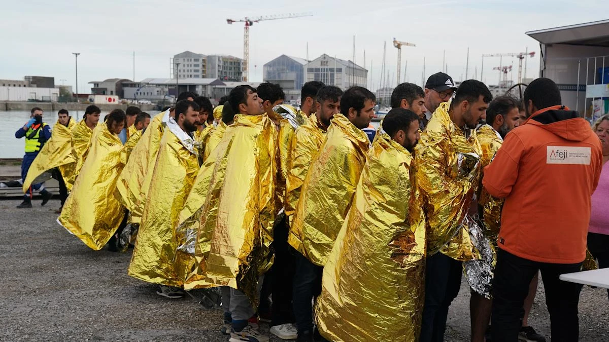 French coastguard rescues 94 people from water after small boat breaks apart