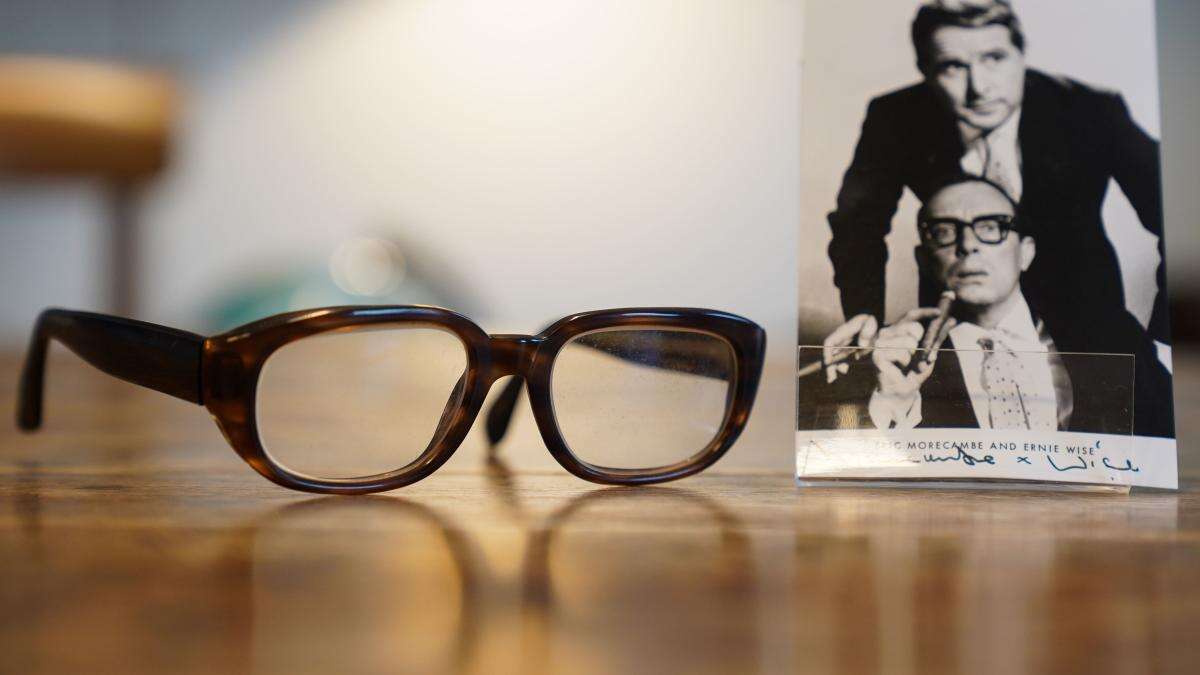 Eric Morecambe’s glasses fetch £20,000 at auction