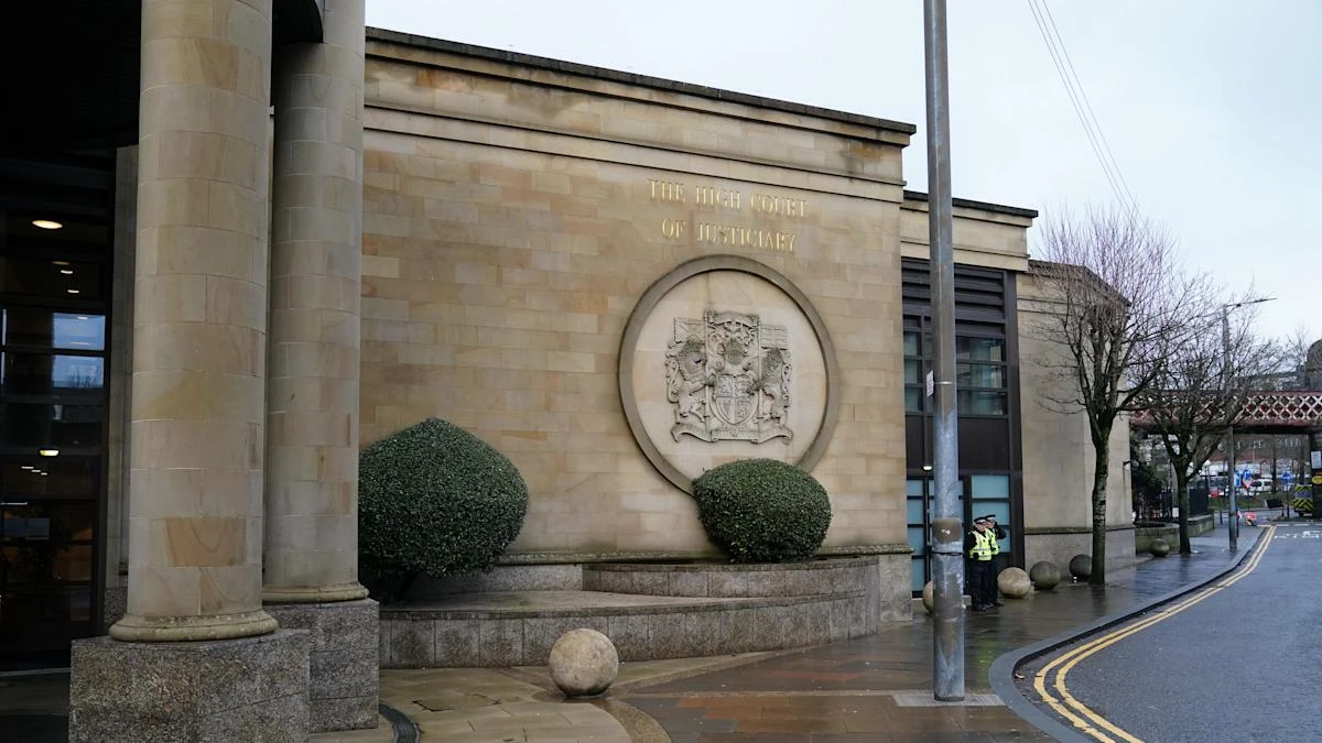 Teenager in court accused of pushing woman in front of train