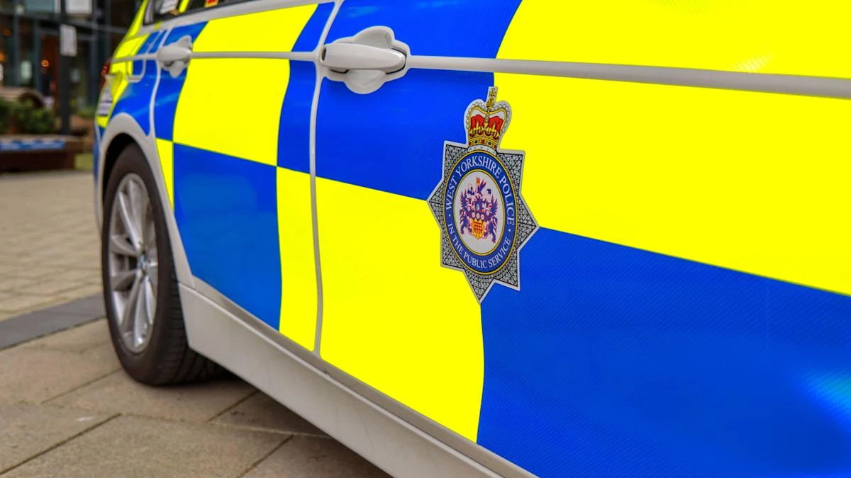 Police worker charged with trying to arrange sexual activity with child under 13