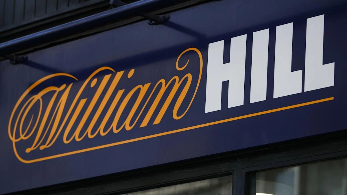 William Hill owner says UK arm impacted by tighter gambling restrictions