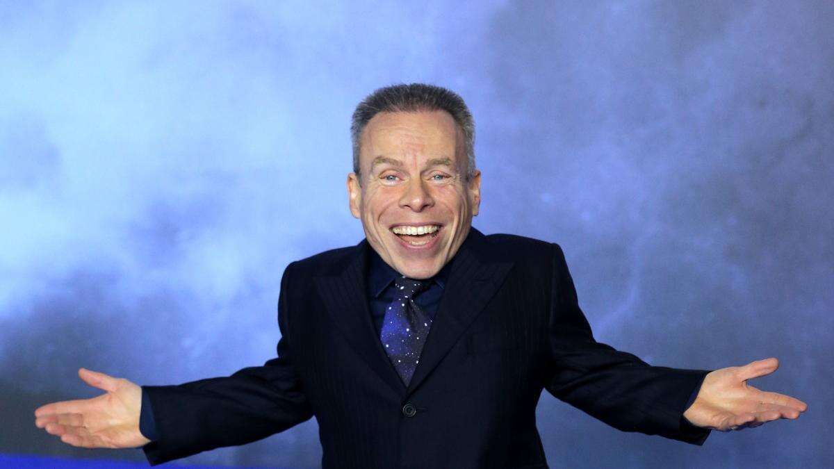 Actor Warwick Davis to receive Bafta Fellowship next month