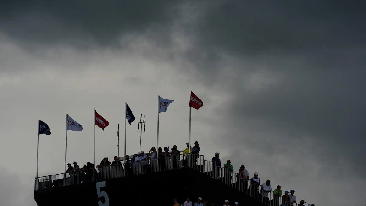 Heavy rain halts play at US Open with overnight leader Sam Burns still ahead