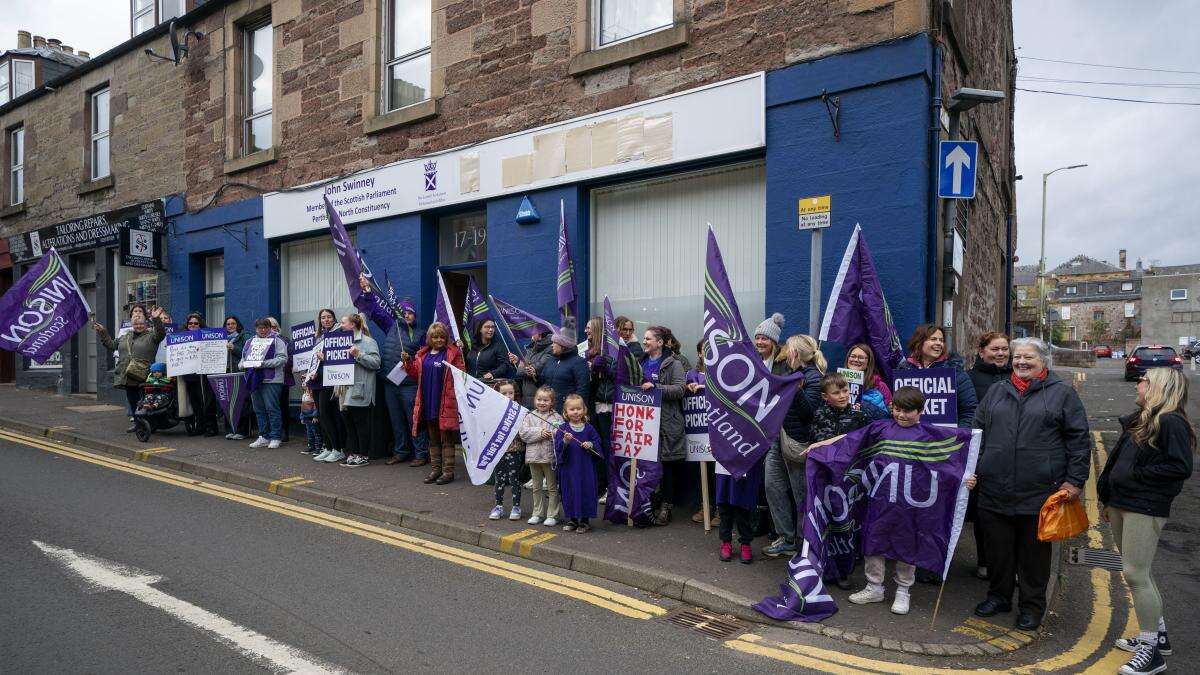 Swinney ‘deeply disappointed’ as striking union members protest outside office