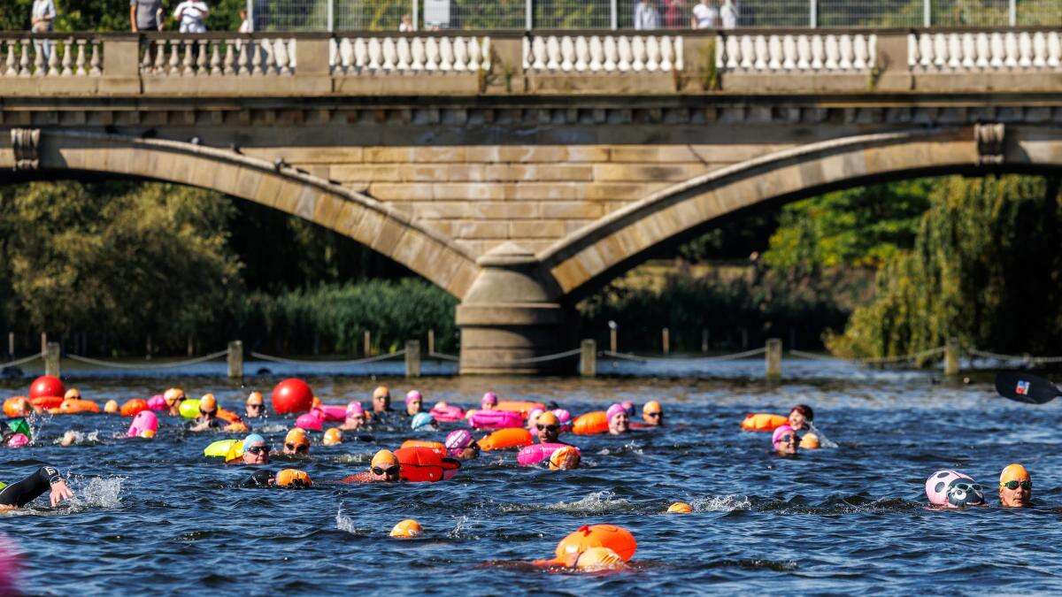 Thousands take a dip in Hyde Park’s Serpentine for open water festival