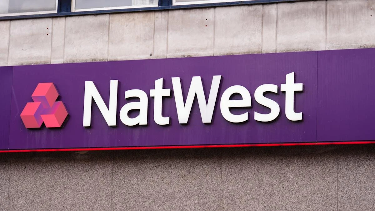 Protesters halt NatWest shareholder meeting as boss defends climate policy