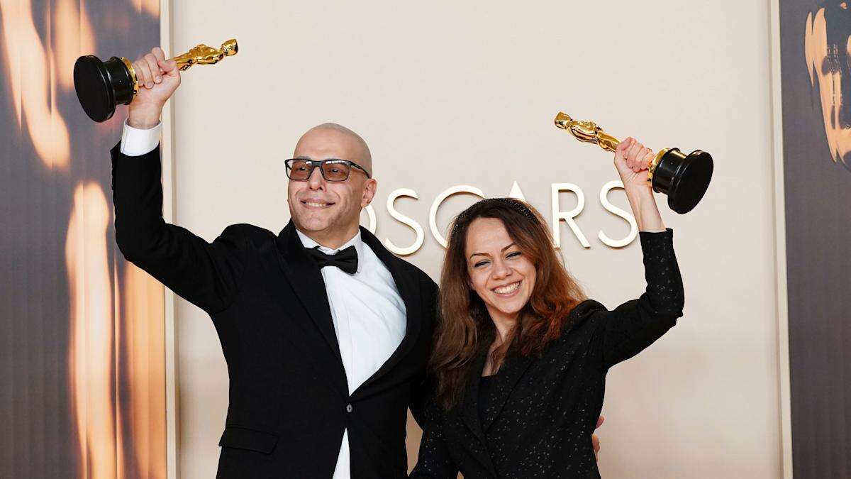 ‘A miracle’ – directors win Oscar for Iranian film hours after landing in LA