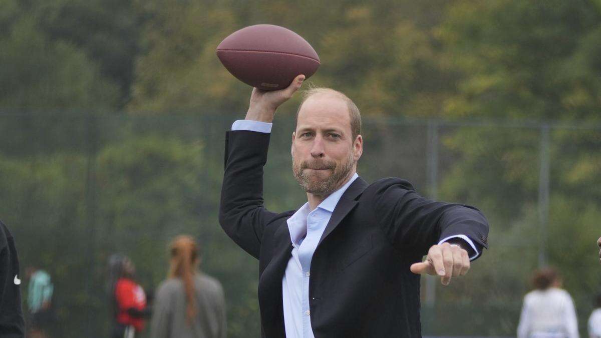 William shows off ‘unbelievable arm’ playing American football with youngsters