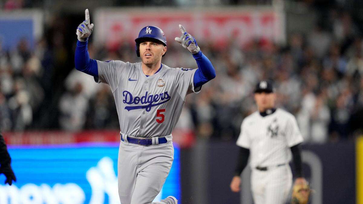 Los Angeles Dodgers hang on late to clinch third win of World Series