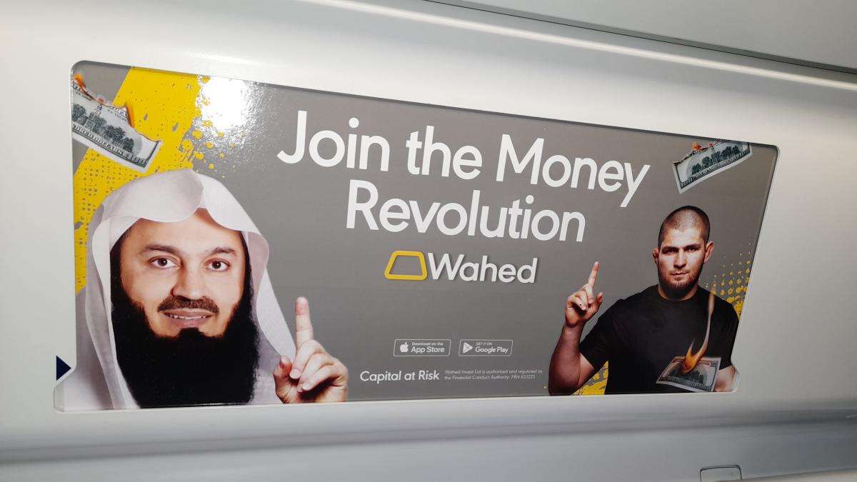 Ads for Islamic investment platform showing burning US and euro banknotes banned