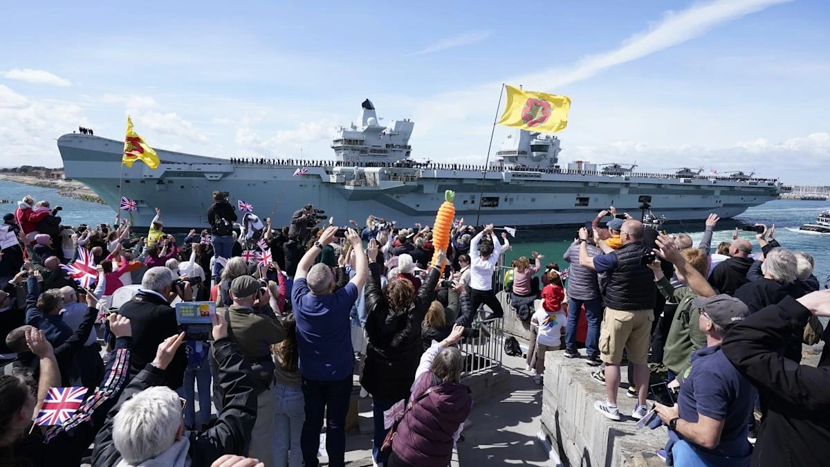 Crowds wave off Navy flagship as it sets sail for Indo-Pacific