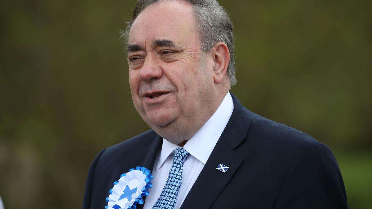 Plane carrying body of former first minister Alex Salmond lands in Aberdeen