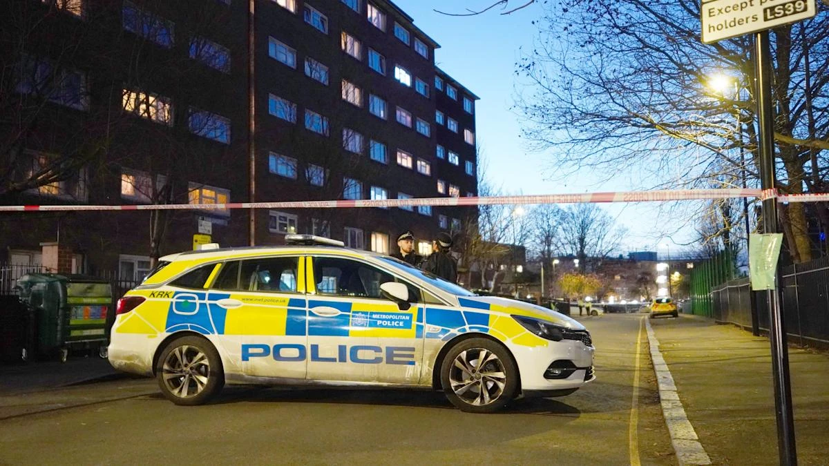 Boy shot dead in south London by assailant dressed as delivery driver on moped