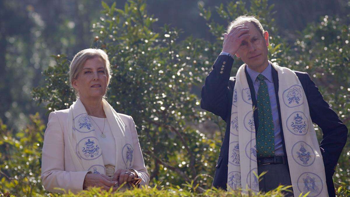 Edward and Sophie joke together and hold hands on tour of Nepali botanic garden