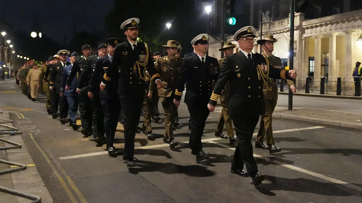 Armed forces parade overnight through London in VE Day dress rehearsal