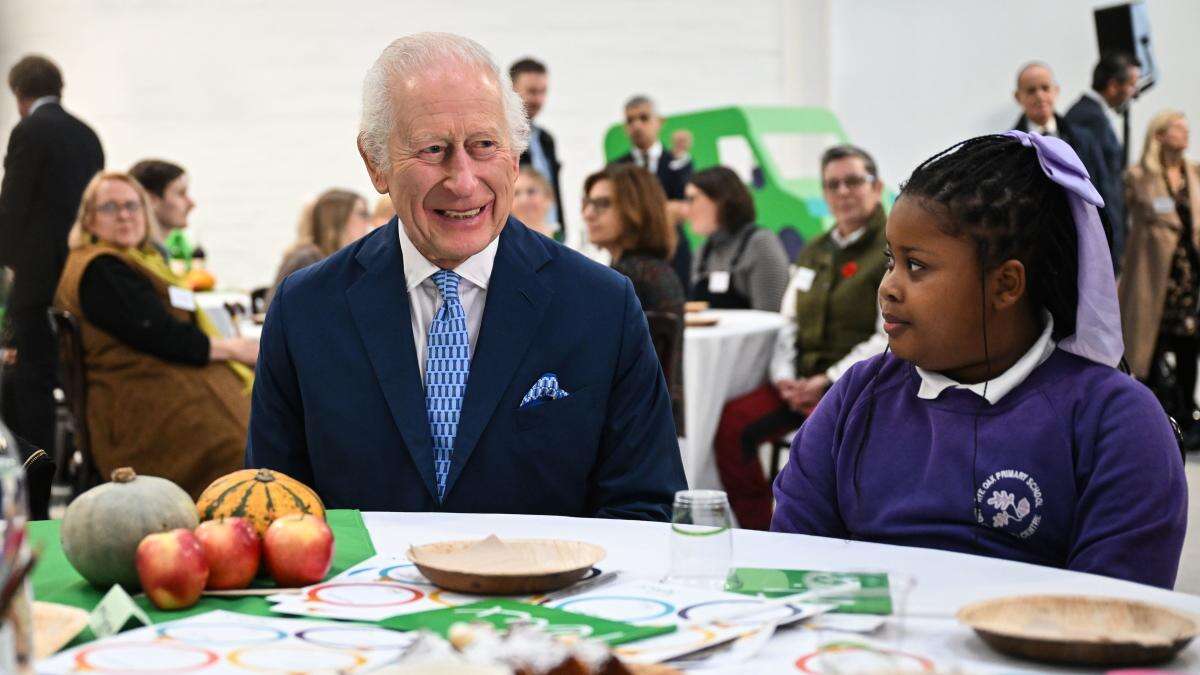 Charles makes birthday visit to surplus food project