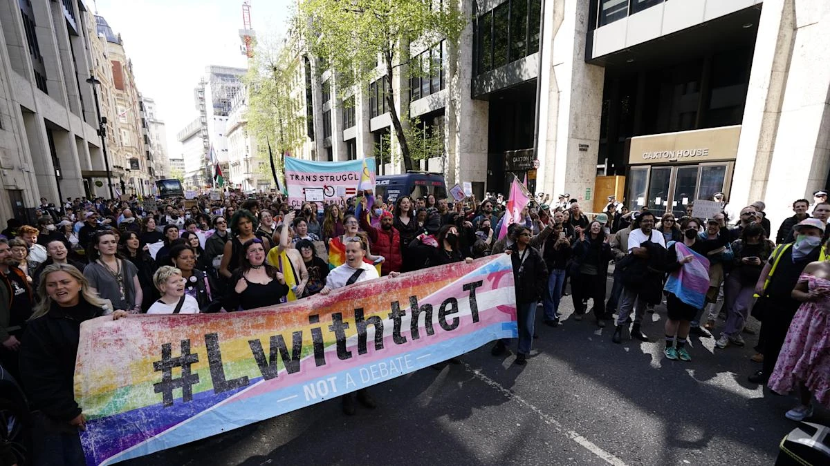 Thousands march in protest at Supreme Court ruling on definition of a woman
