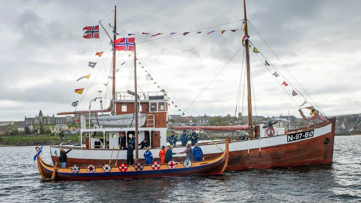 ‘Shetland Bus’ convoy greeted with floating salute as it arrives in Lerwick