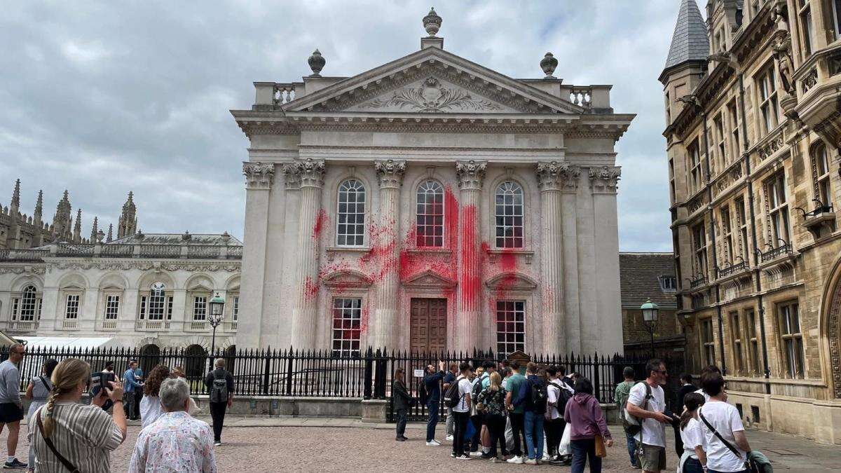 Pro-Palestinian protesters spray red paint on Cambridge graduation building