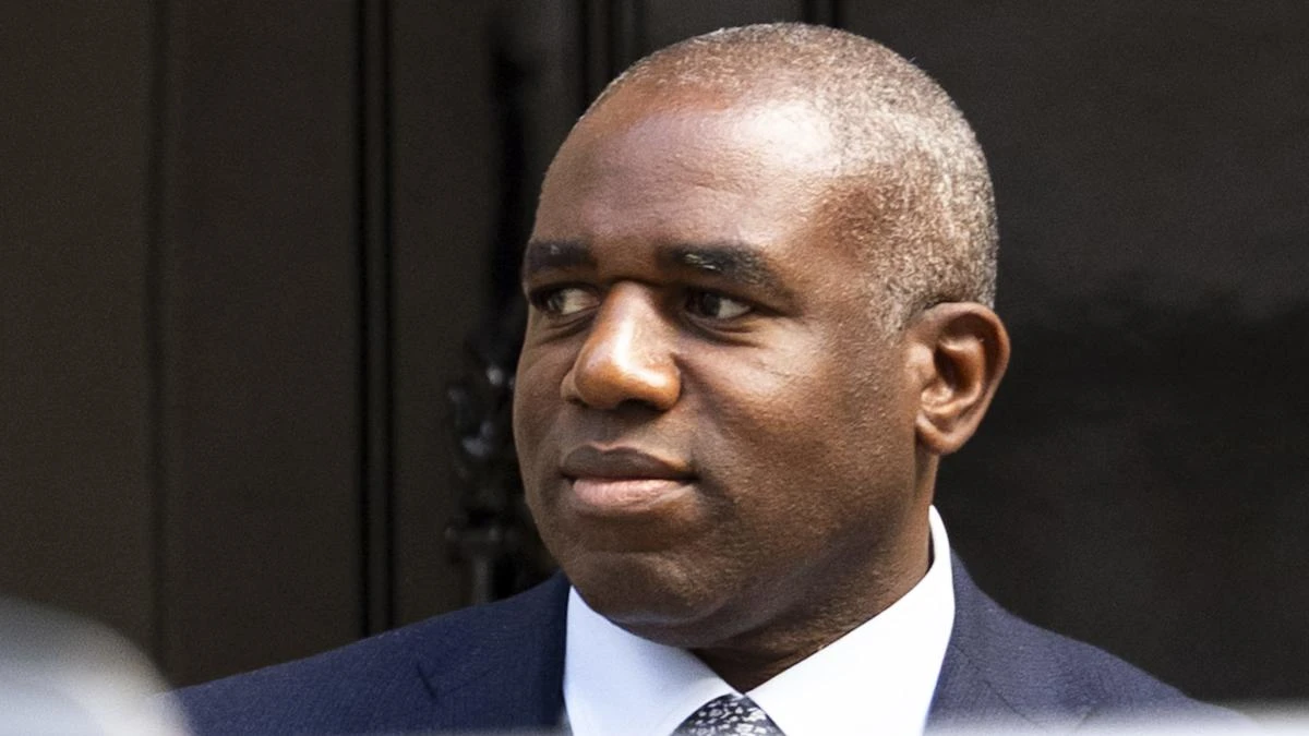 Lammy says France returns deal an ‘immediate deterrent’ as two migrants deported