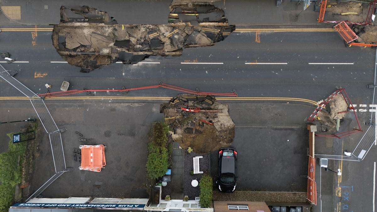 Sinkhole that wrecked Surrey street could take year to fix, residents told