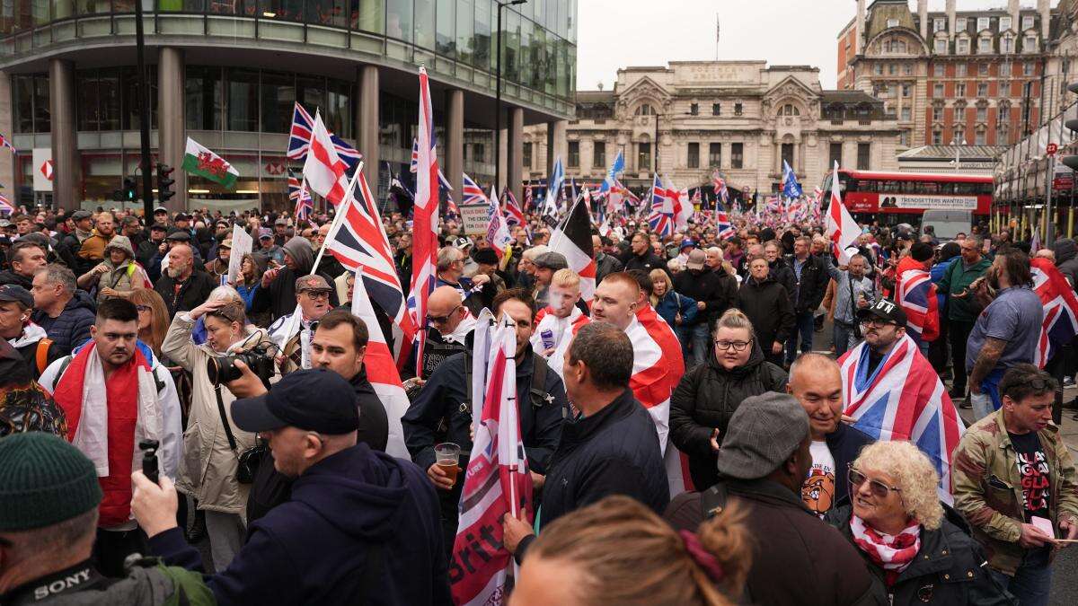 Hundreds gather for Tommy Robinson’s protest which he will miss while in custody