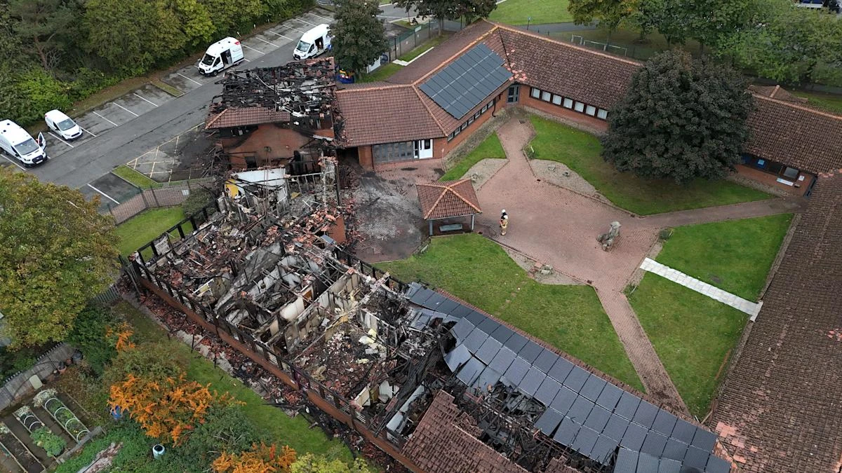 Man arrested on suspicion of criminal damage and arson after fire at MP’s office