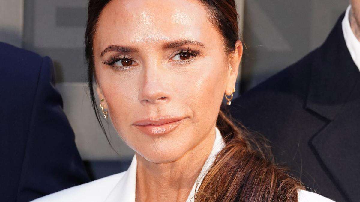 Victoria Beckham given a women of the year prize by daughter Harper