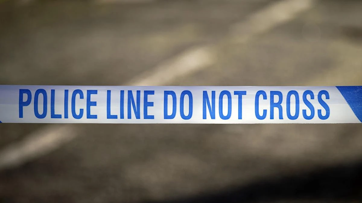 Teenager held on suspicion of murder after woman falls from block of flats