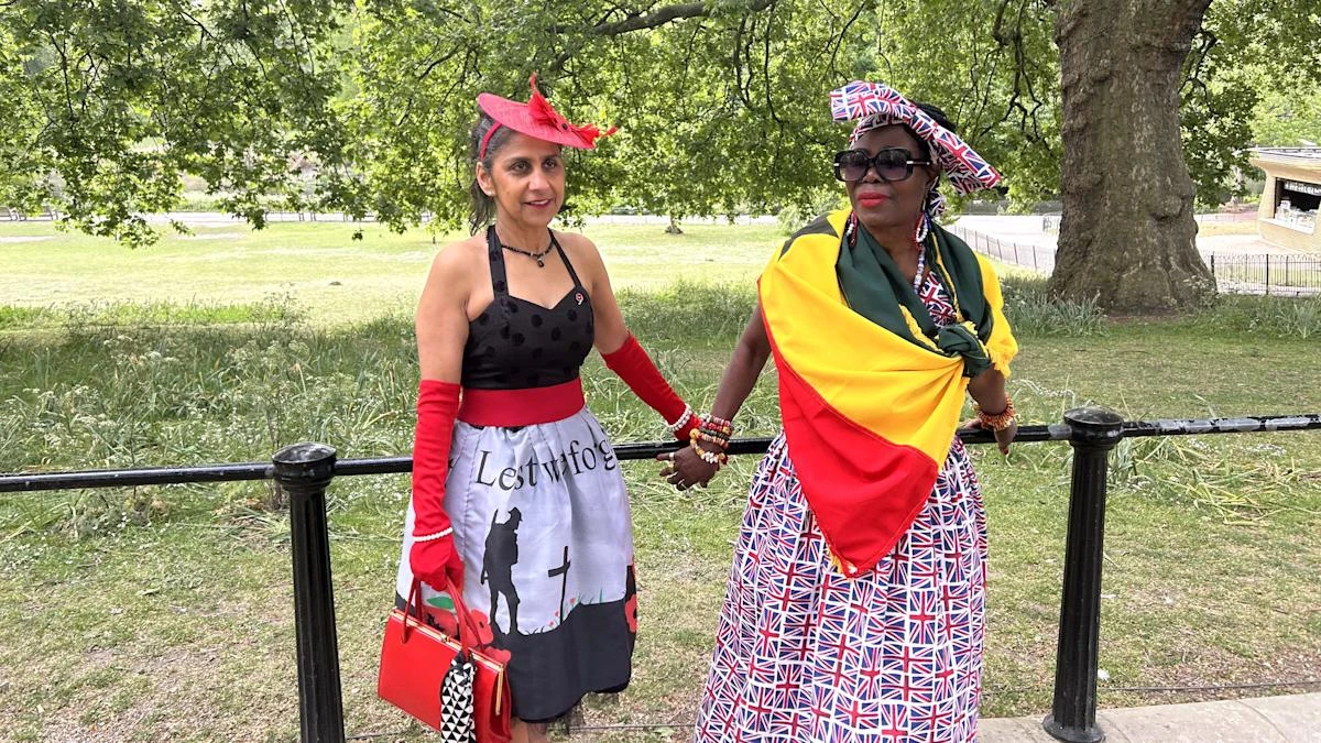 Visitors look the part in special dresses made for VE Day celebrations