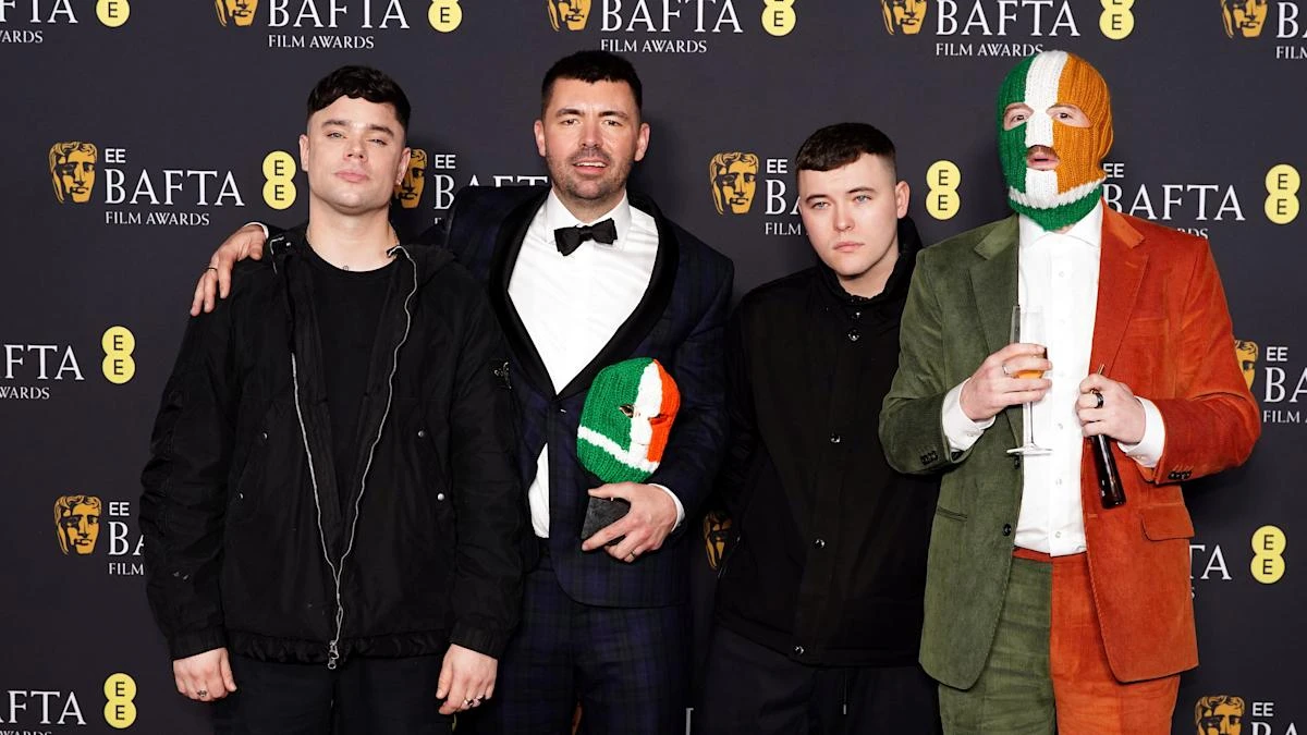 Festival urged to reconsider inclusion of rap group after ‘dead Tory’ comments