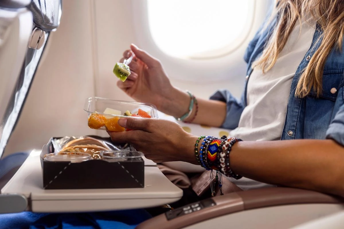 5 foods and drinks to avoid having on a plane, according to a dietitian