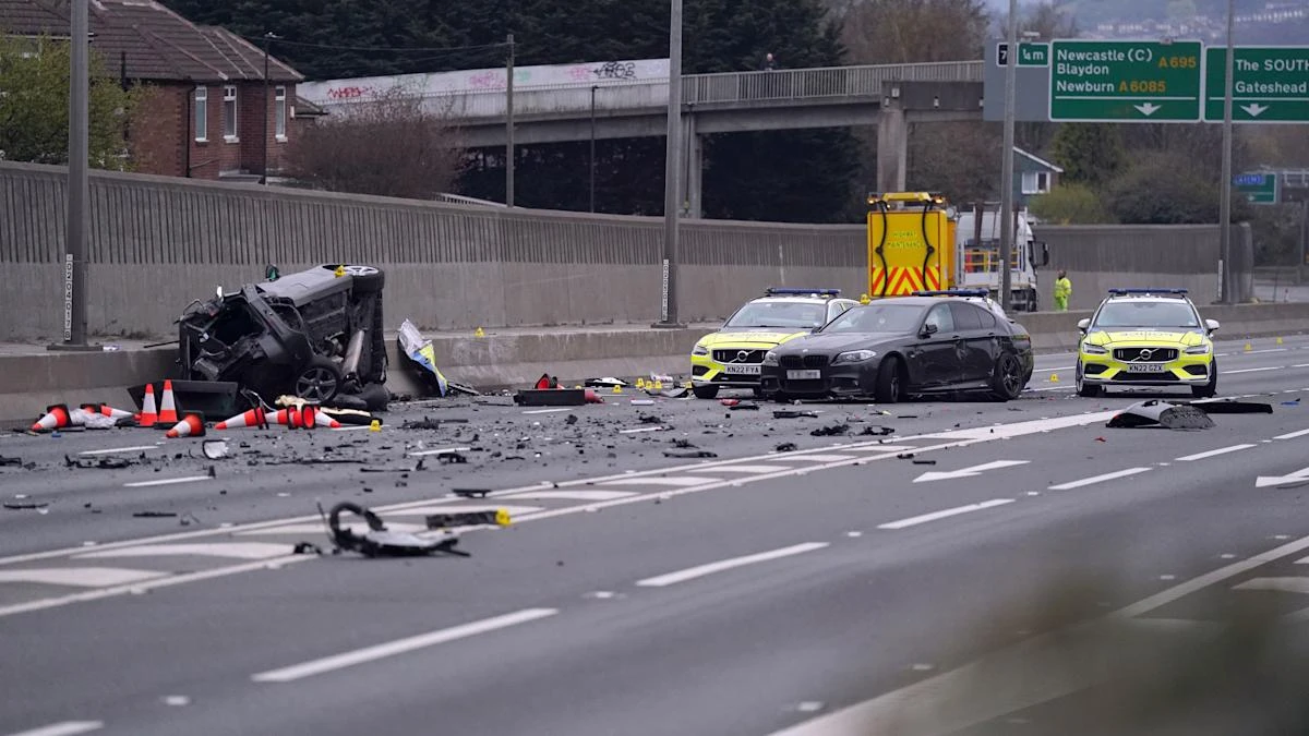 Police vehicles badly damaged in major collision which shut the A1