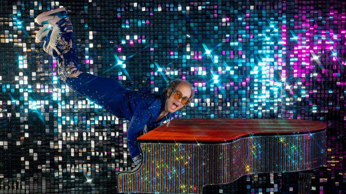 Elton John keyboard handstand waxwork unveiled at London’s Madame Tussauds