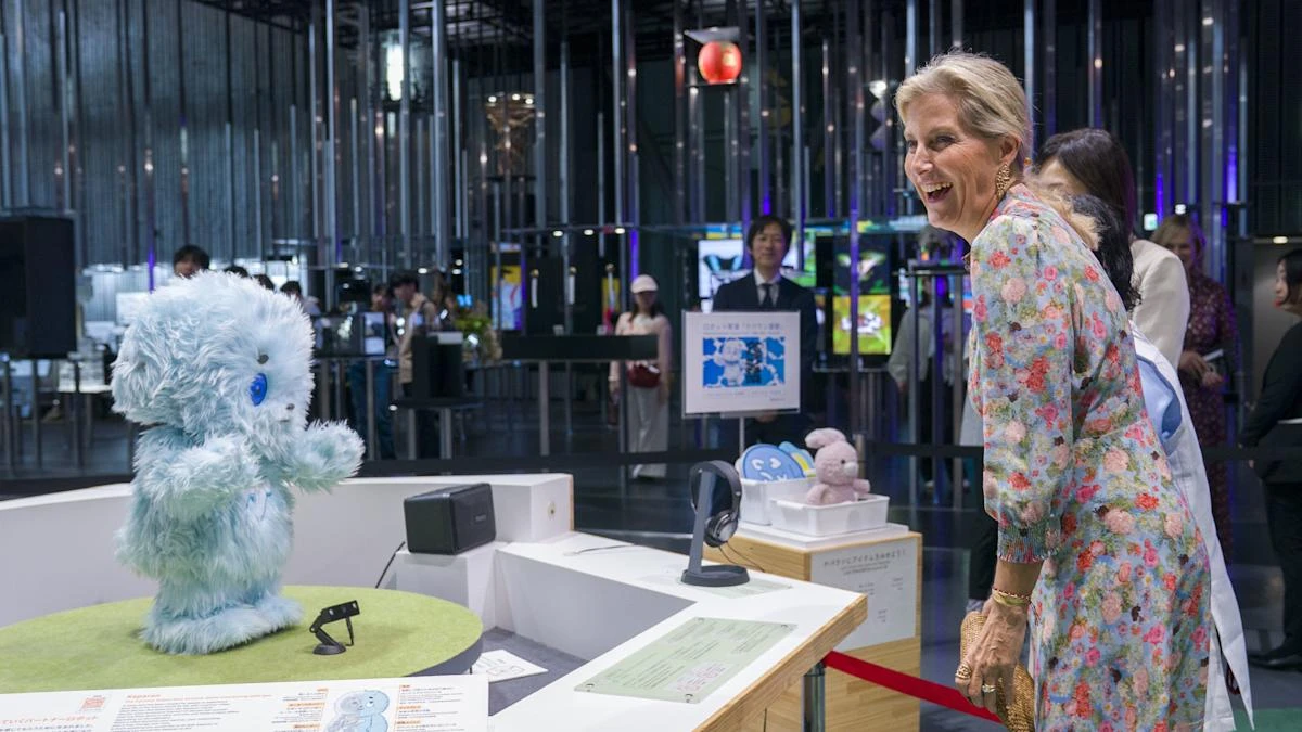 Duchess of Edinburgh interacts with robot dog during Japan visit