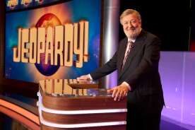 Stephen Fry goes behind the lectern to host ‘Jeopardy! UK’