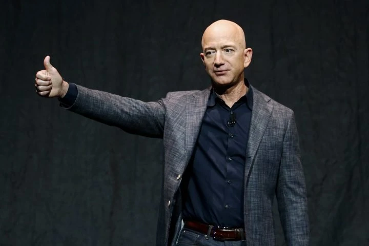 Bidder pays $28M in charity auction to book space flight with Jeff Bezos