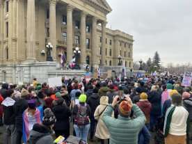 Protester rally at Alberta legislature to oppose bills affecting trans rights