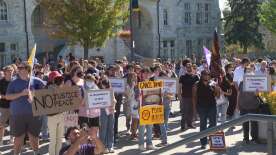 Hundreds protest proposed cuts to graduate awards at Queen’s University