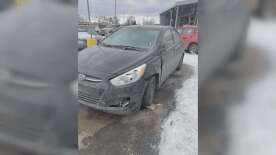 A Calgary woman seeks answers after car allegedly hit by armoured truck