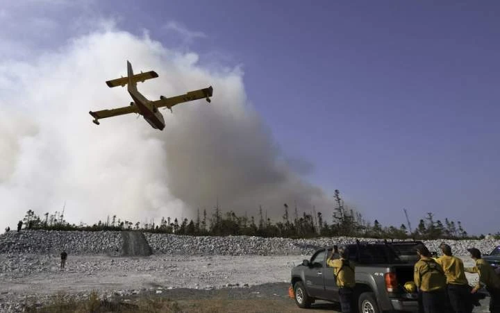 Nova Scotia wildfires grows; cooler temperatures help firefighters in N.L.