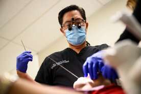 Ottawa to make dental care program available to more Canadians