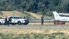 Incident at Vancouver airport temporarily halts flights, police seen on runway