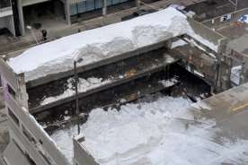 Snow-covered parking garage in Ottawa partially collapses, vehicles trapped