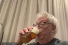 Bottoms up! Ontario councillor under fire for drinking beer during meeting