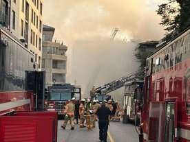 5-alarm fire in Montreal’s old port sends 1 to hospital with severe burns