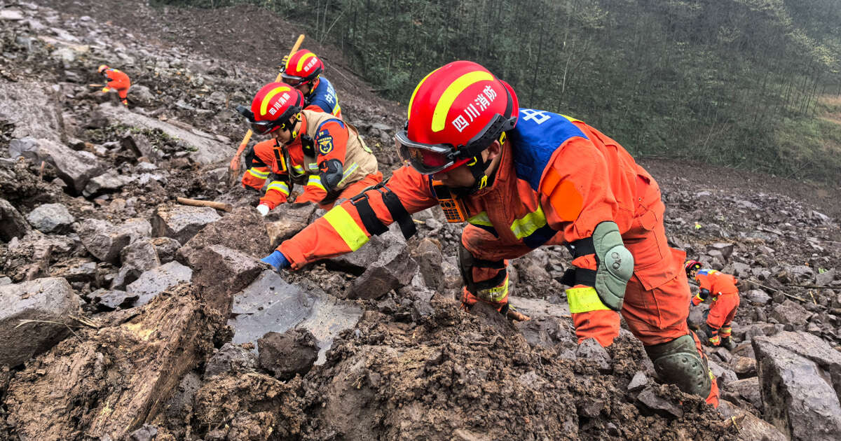 Rescuers recover 1 body and search for 28 people in a landslide in southwest China 