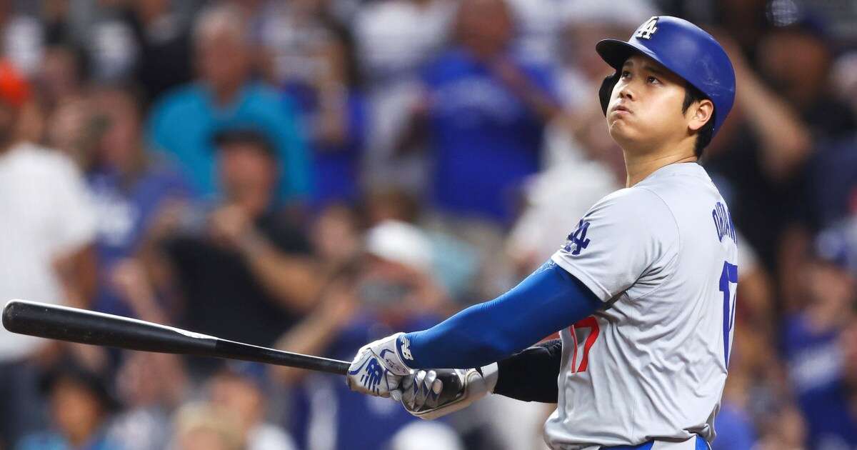 Dodgers' Shohei Ohtani becomes first player to hit 50 home runs and steal 50 bases in a season