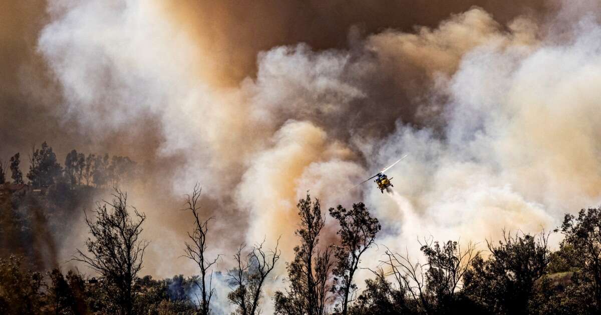 Fires trigger red flag warnings in Northeast as crews continue to battle California blaze