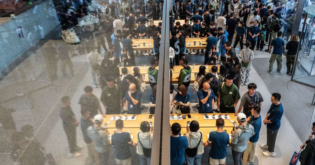 Apple and Huawei battle for sales as their new phones launch on the same day in China